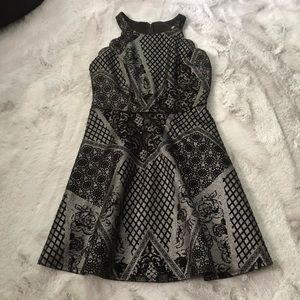 Metallic silver and black skater dress